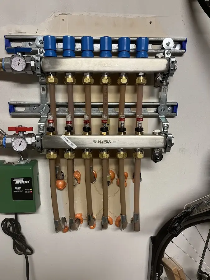 Plumber performing Water Heater Repair at a residential property in Redstone